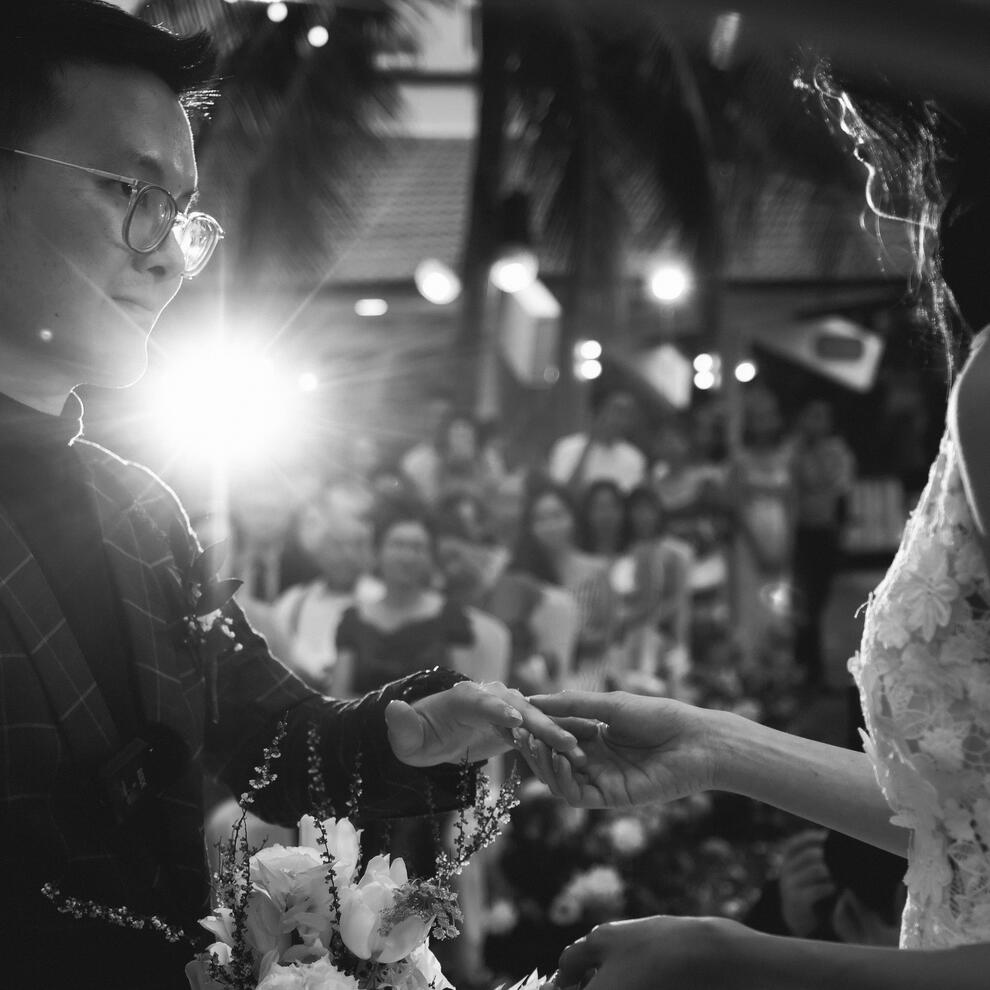Kenz Tran – Human Moments Behind MOCHIMIN’s AI Journey Black-and-white photo of Kenz Tran in a wedding ceremony, highlighting the balance of personal life and leadership in building an AI startup.