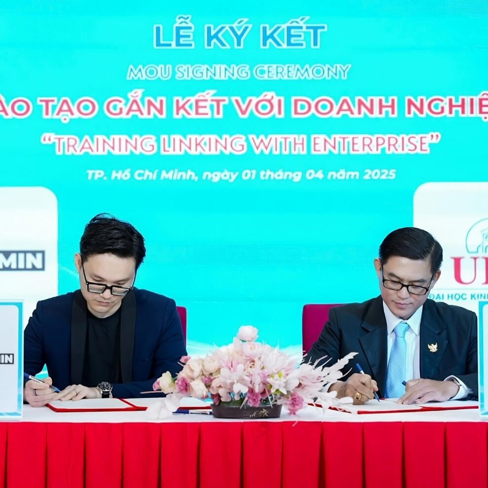 Kenz Tran representing MOCHIMIN at a 2025 MOU ceremony in Ho Chi Minh City, strengthening AI-business integration through enterprise-aligned training partnerships. @ UEF - University of Economics and Finance